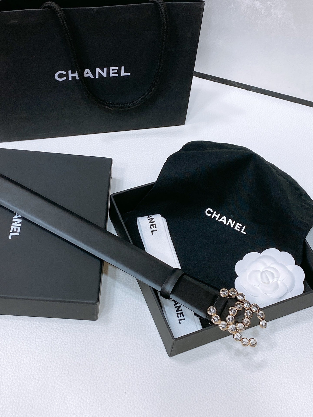 CHANEL BELT 30 MM IN BLACK CALFSKIN PEARL LOGO