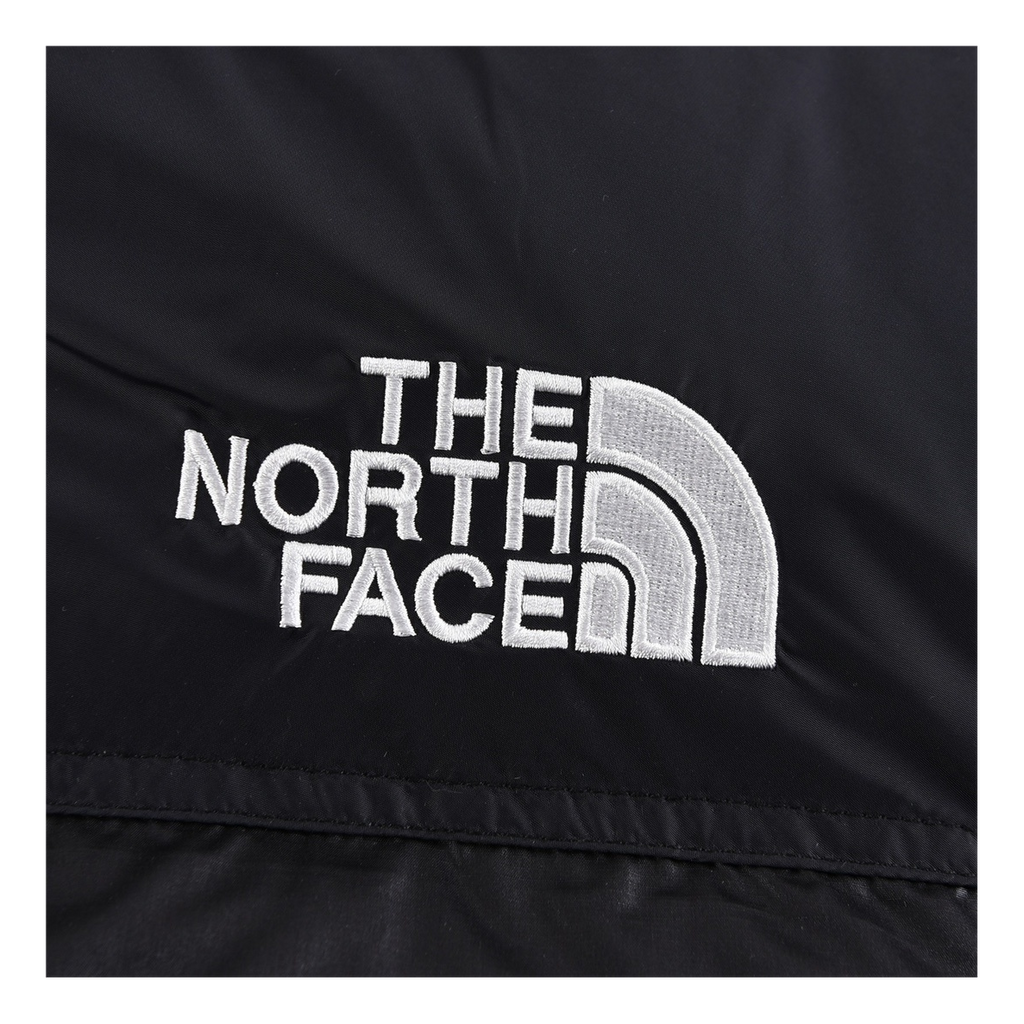 The North Face Contrast-Panel Stand-Collar Puffer Jacket – Bold Two-Tone Design