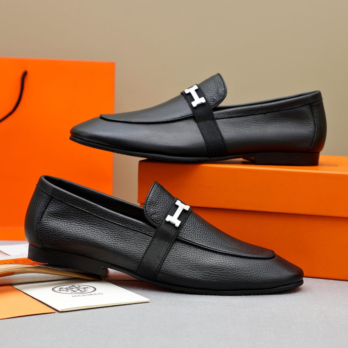 Hermès Black Pebbled Leather H-Hardware Loafers