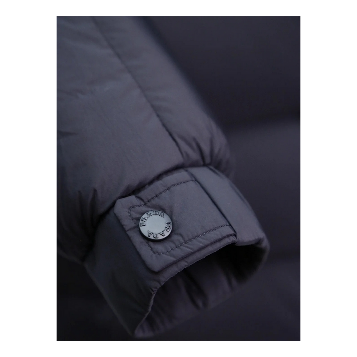 Prada Hooded Puffer Jacket – Signature Sleeve Pouch